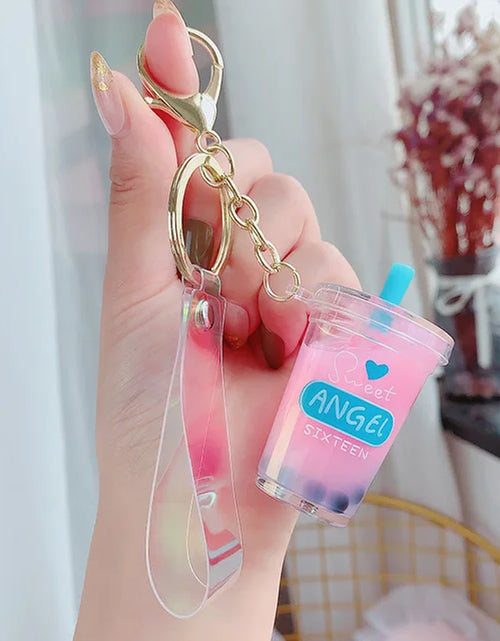 Load image into Gallery viewer, Creative Floating Unicorn Milk Tea Cup Bottle Keychain Cute Fruit Daisy Cat Bubble Tea Quicksand Sequins Liquid Car Keys Chain
