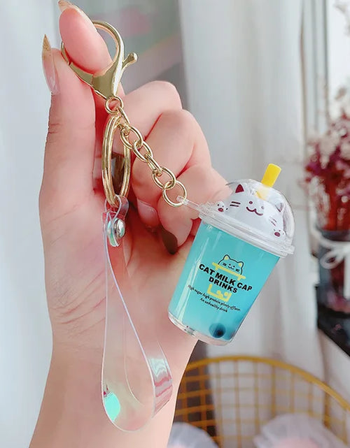 Load image into Gallery viewer, Creative Floating Unicorn Milk Tea Cup Bottle Keychain Cute Fruit Daisy Cat Bubble Tea Quicksand Sequins Liquid Car Keys Chain
