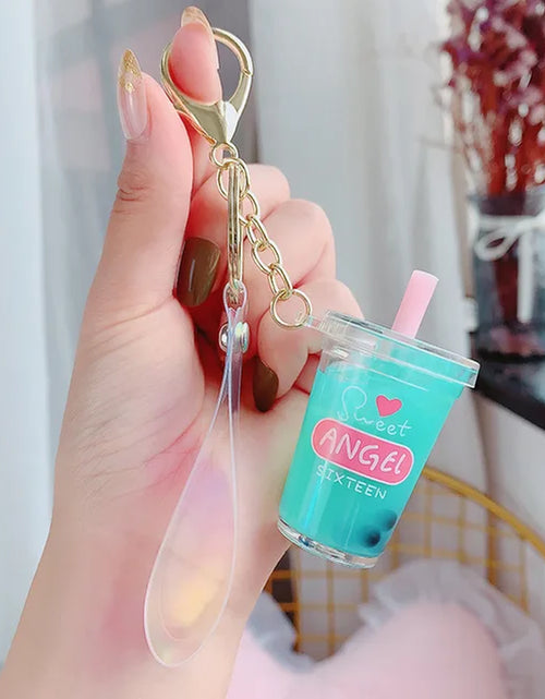 Load image into Gallery viewer, Creative Floating Unicorn Milk Tea Cup Bottle Keychain Cute Fruit Daisy Cat Bubble Tea Quicksand Sequins Liquid Car Keys Chain
