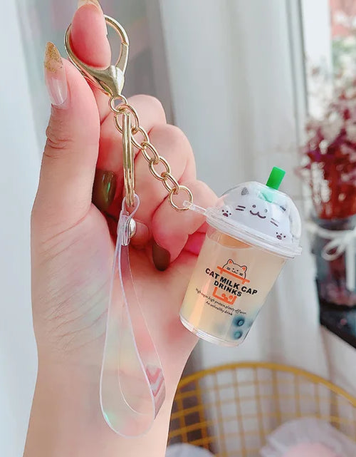 Load image into Gallery viewer, Creative Floating Unicorn Milk Tea Cup Bottle Keychain Cute Fruit Daisy Cat Bubble Tea Quicksand Sequins Liquid Car Keys Chain
