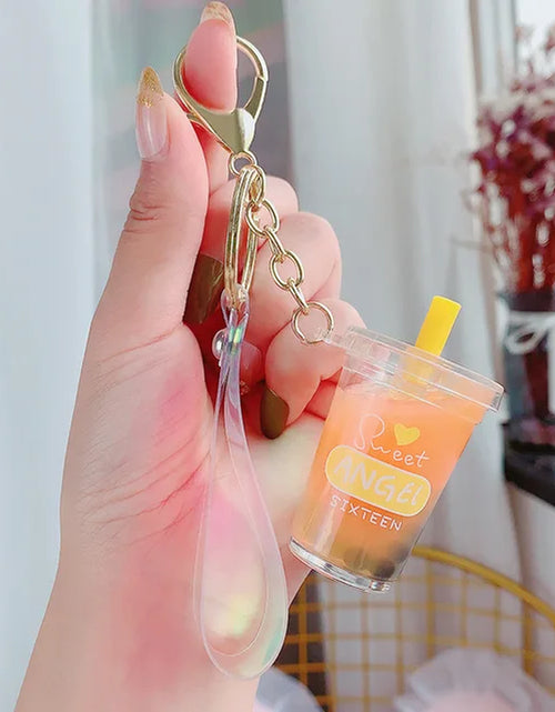 Load image into Gallery viewer, Creative Floating Unicorn Milk Tea Cup Bottle Keychain Cute Fruit Daisy Cat Bubble Tea Quicksand Sequins Liquid Car Keys Chain
