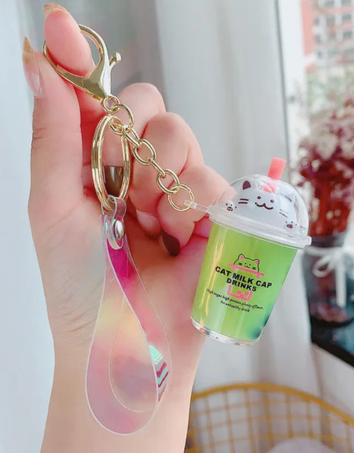 Load image into Gallery viewer, Creative Floating Unicorn Milk Tea Cup Bottle Keychain Cute Fruit Daisy Cat Bubble Tea Quicksand Sequins Liquid Car Keys Chain
