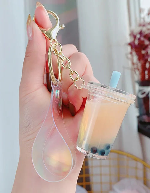 Load image into Gallery viewer, Creative Floating Unicorn Milk Tea Cup Bottle Keychain Cute Fruit Daisy Cat Bubble Tea Quicksand Sequins Liquid Car Keys Chain
