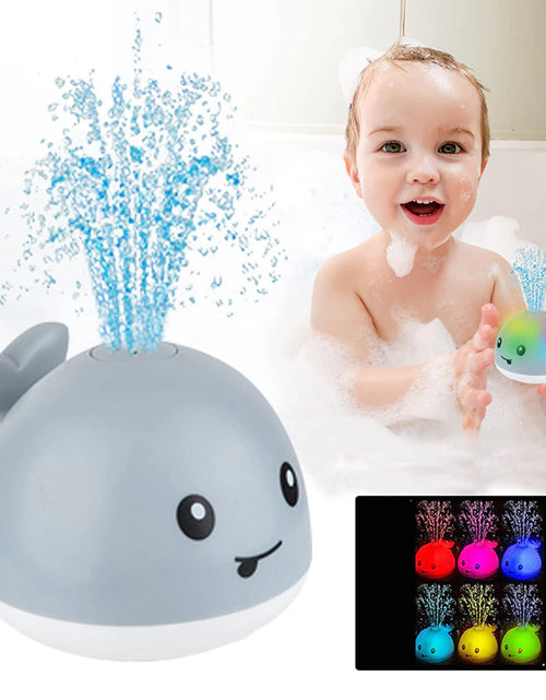 Load image into Gallery viewer, Baby Light up Bath Toys Whale Automatic Sprinkler Bathtub Toys Pool Bathroom Shower Bath Toys for Toddlers Infant Kids Boy Gift
